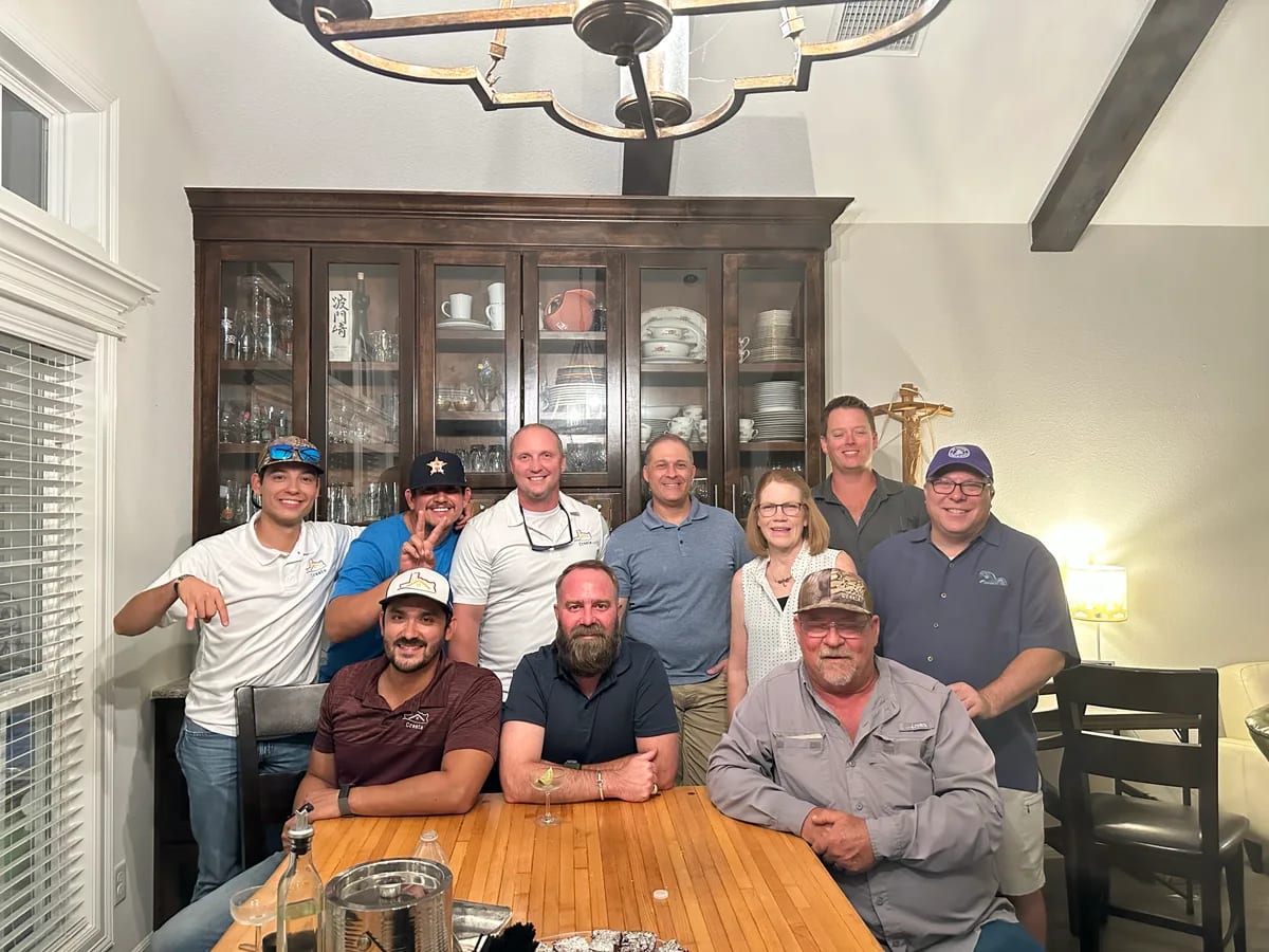Members of the Create team gathered around a table
