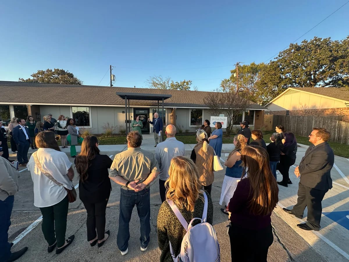 Community members gathered outside BCS Together